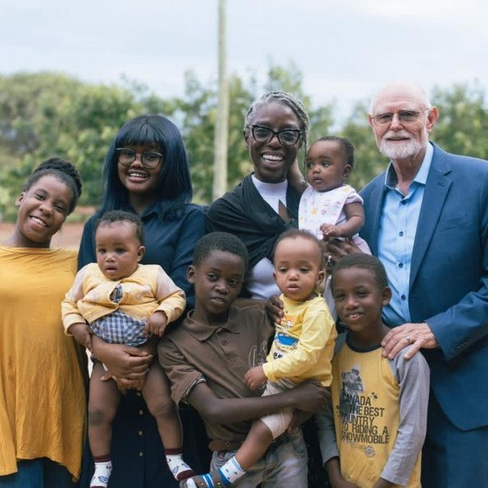 Caretakers with children at Falcos Village