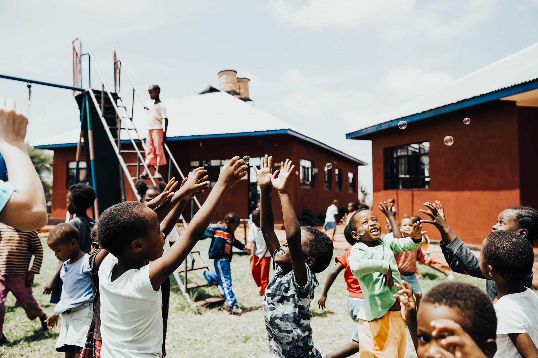 Children playing with bubbles
