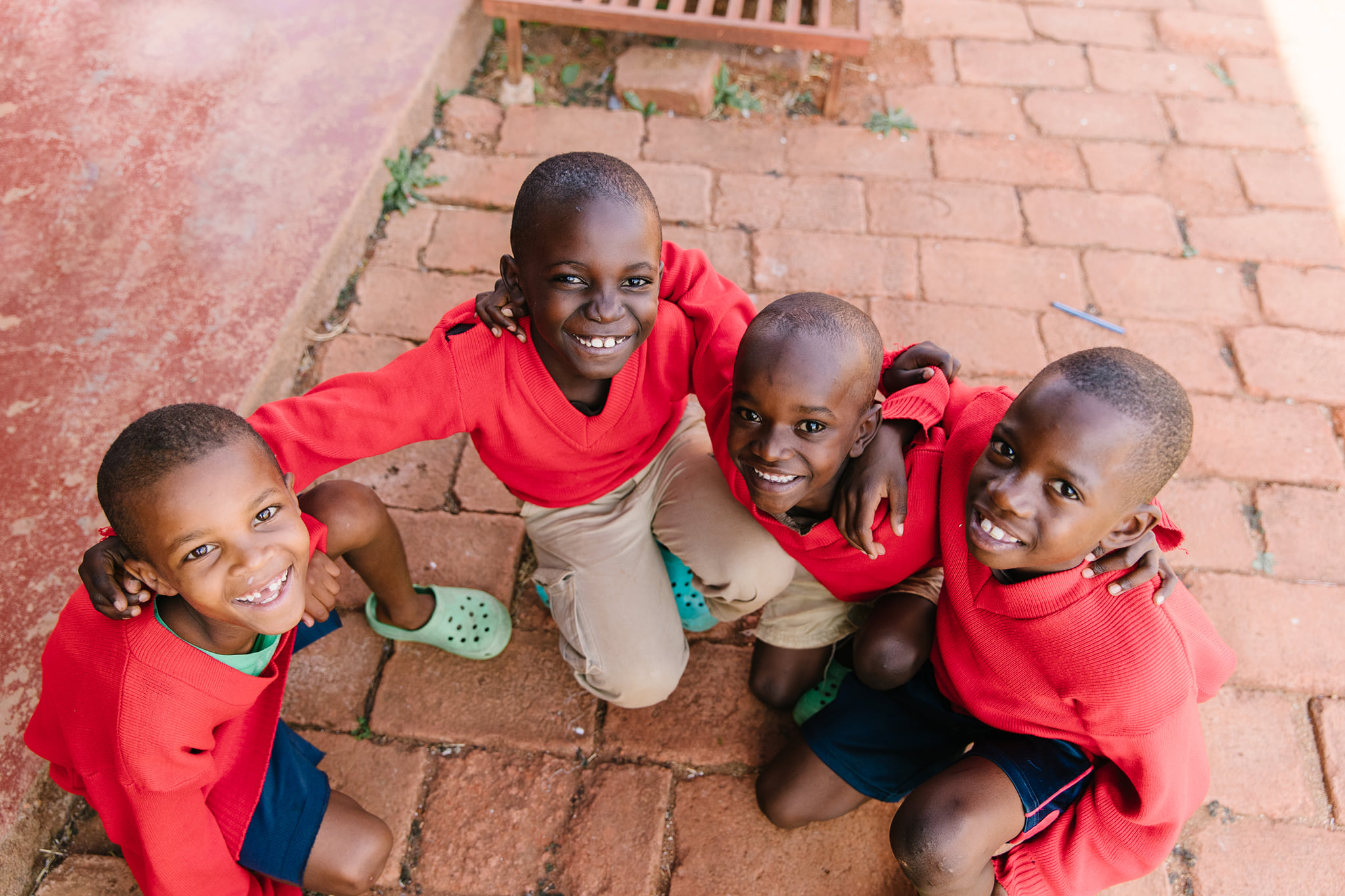 Boys in red sweaters